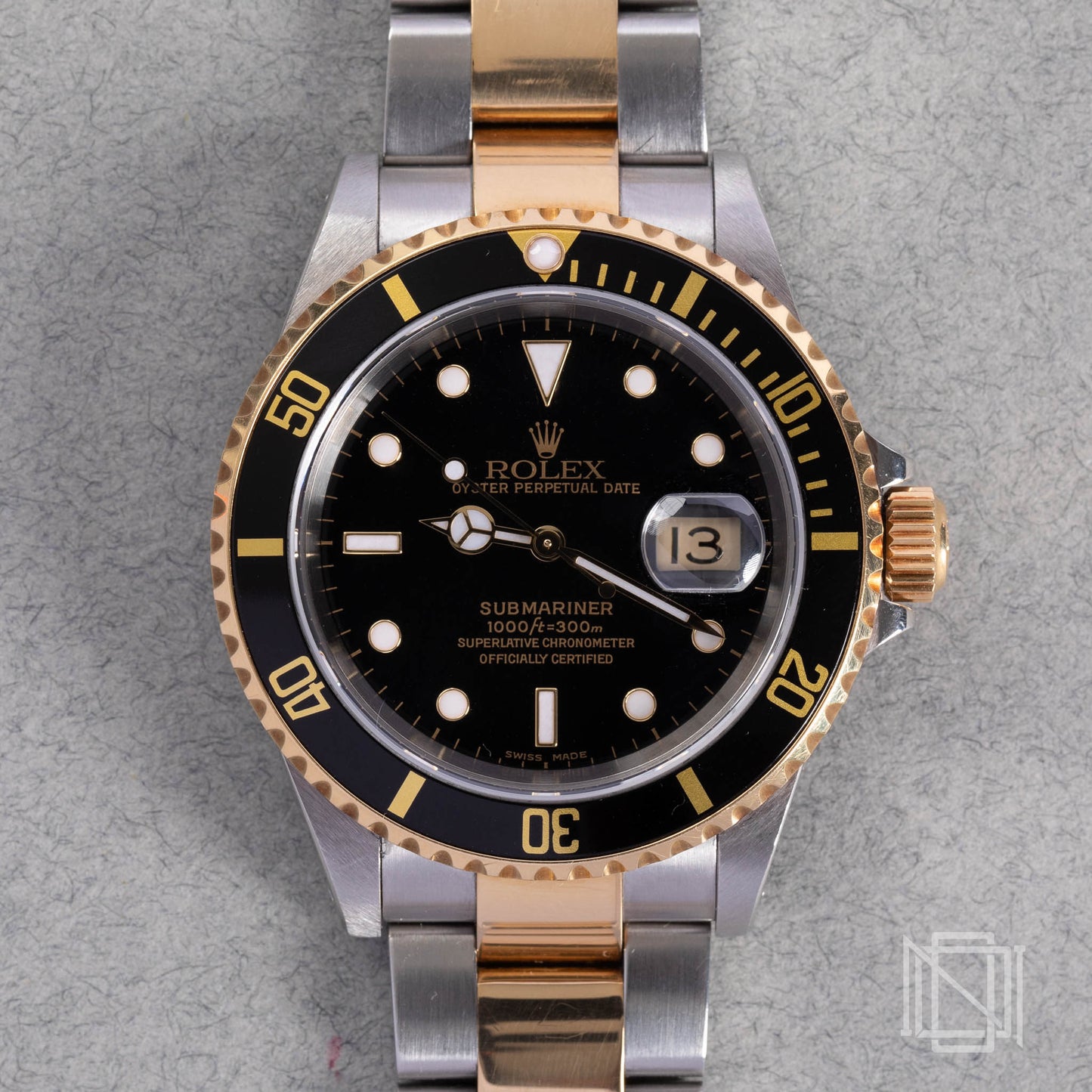 Rolex Submariner - Aço e Ouro 16613LN